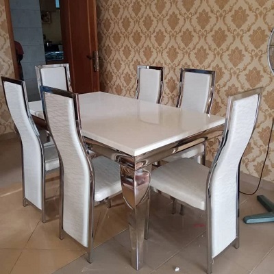 WHITE RECTANGULAR MARBLE TOP DINING TABLE WITH SILVER LEGS BY 6 WHITE CHAIRS WITH SILVER LEGS (NAFU) WHITE RECTANGULAR MARBLE TOP DINING TABLE WITH SILVER LEGS BY 6 WHITE CHAIRS WITH SILVER LEGS (NAFU)